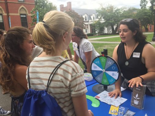 OOS tabling at new student orientation, informing students about various Tufts sustainability resources and programs