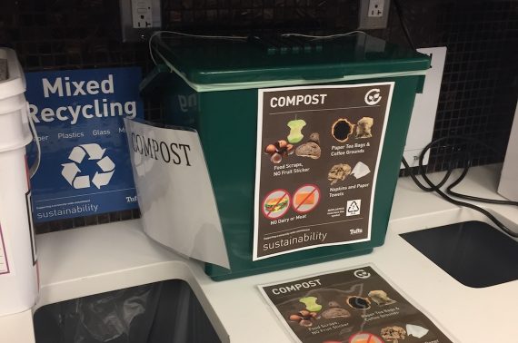 new compost bin next to the existing mixed recycling and landfill bins in the library of the Boston health sciences campus