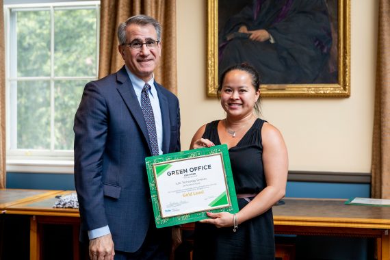 Anthony Monaco awarding someone with Green Office certificate